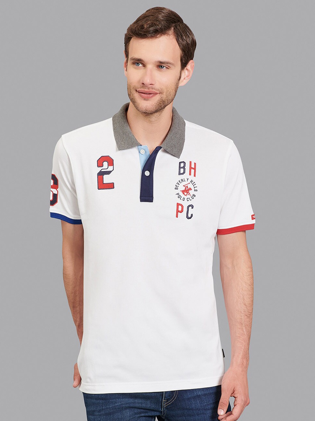 

Beverly Hills Polo Club Men White & Navy Blue Typography Polo Collar T-shirt