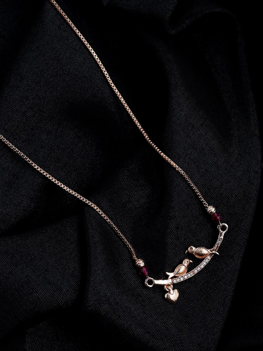 

Shoshaa Gold-Toned & Maroon Brass Gold-Plated Handcrafted Chain