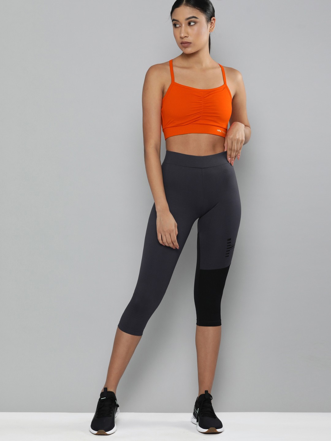 

HRX By Hrithik Roshan Training Women Orange Rapid-Dry Solid Training Sports Bra