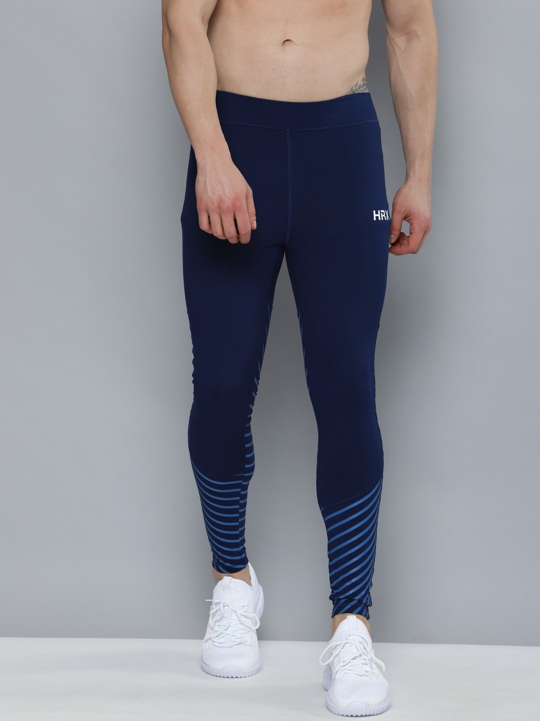 

HRX By Hrithik Roshan Training Men Tone lesser & Estate blue Rapid-Dry colourblock Tights