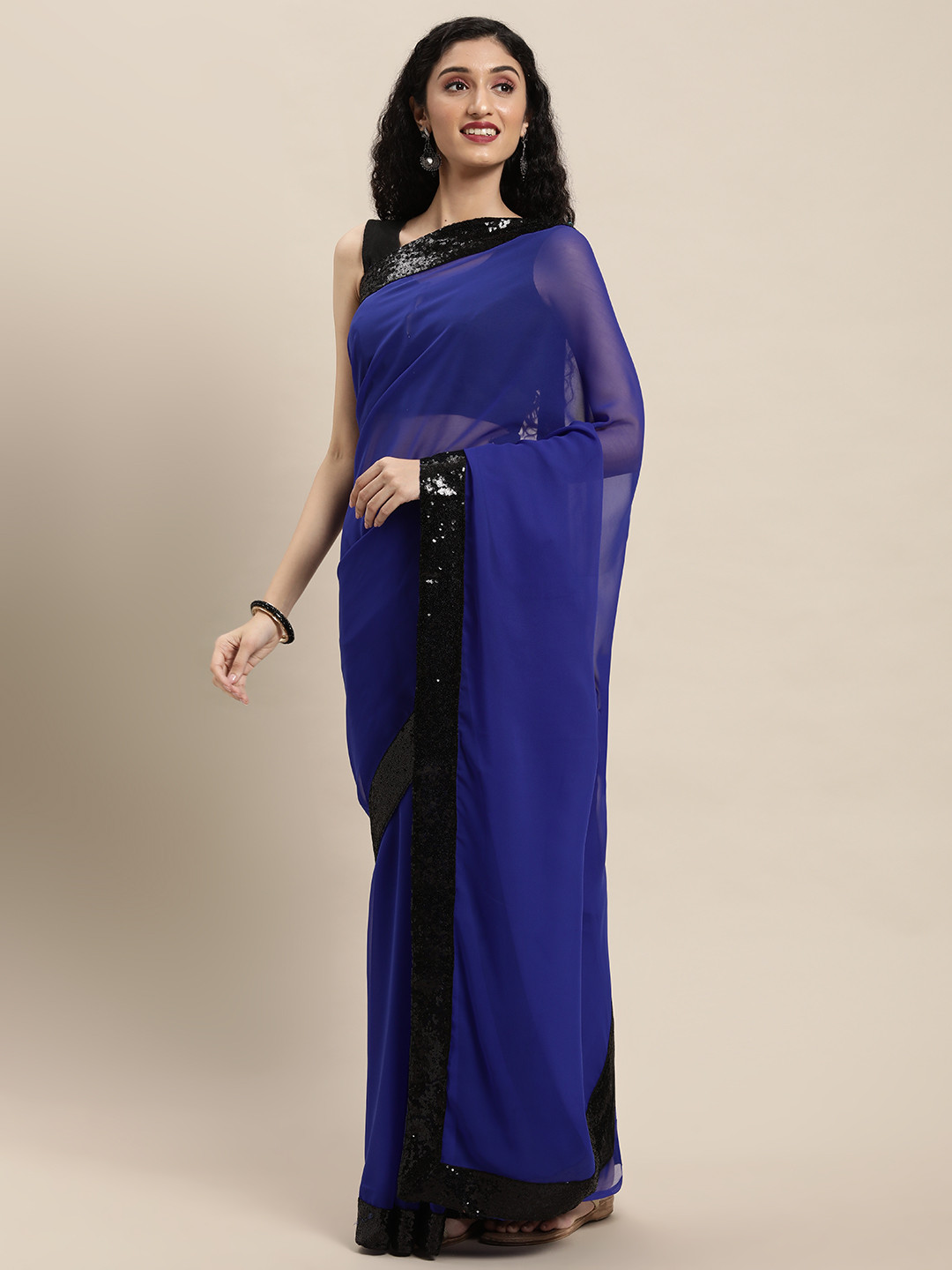 

Mitera Blue Sequinned Poly Georgette Saree