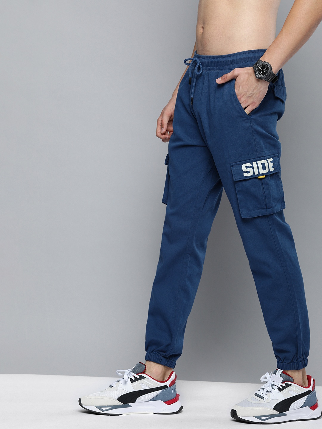 

HERE&NOW Men Navy Blue Printed Cargos Jogger Trousers