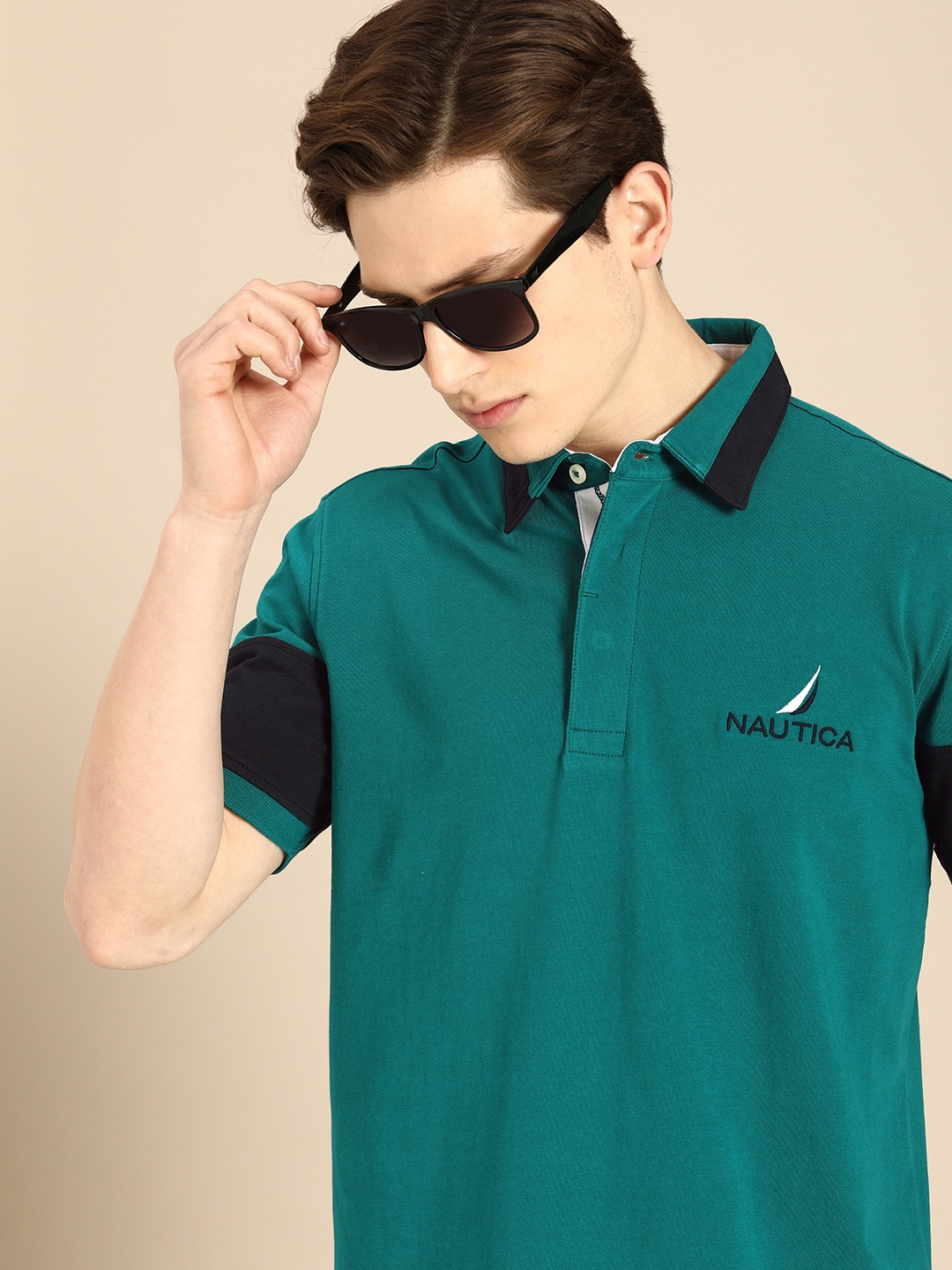 

Nautica Men Teal Green Solid Polo Collar T-shirt