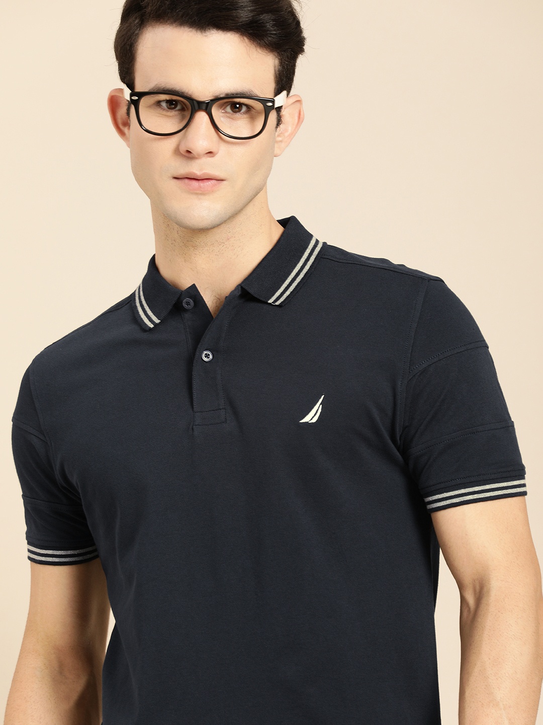 

Nautica Men Navy Blue Solid Regular Fit Polo Collar Casual T-shirt