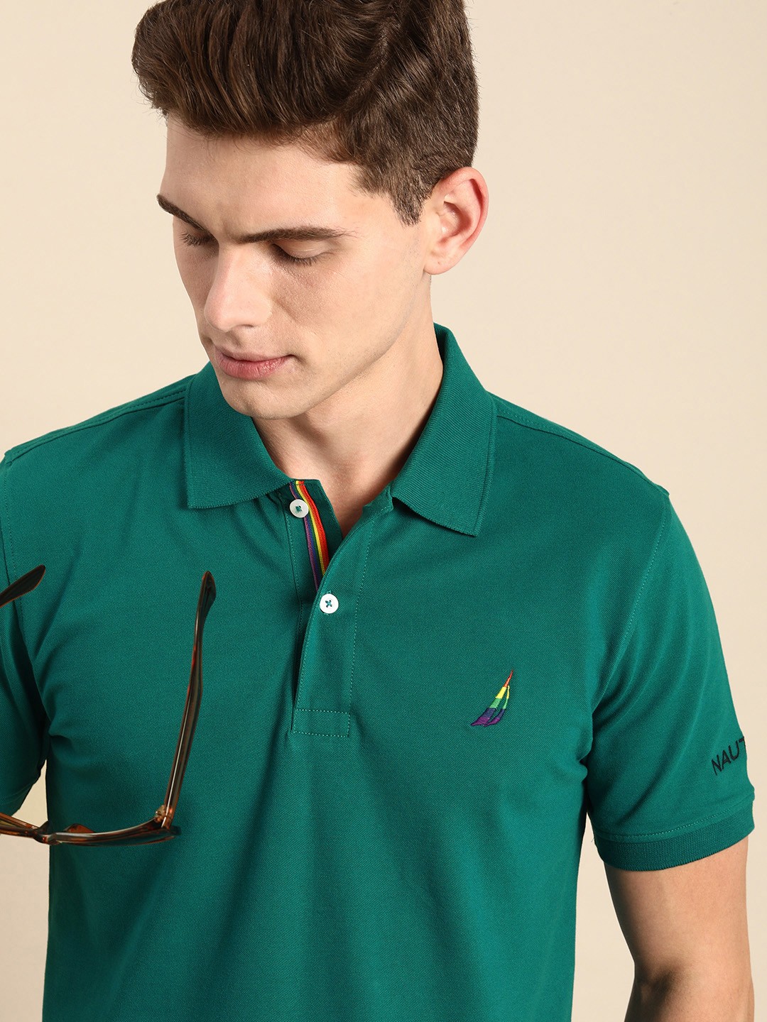 

Nautica Men Teal Solid Polo Collar T-shirt