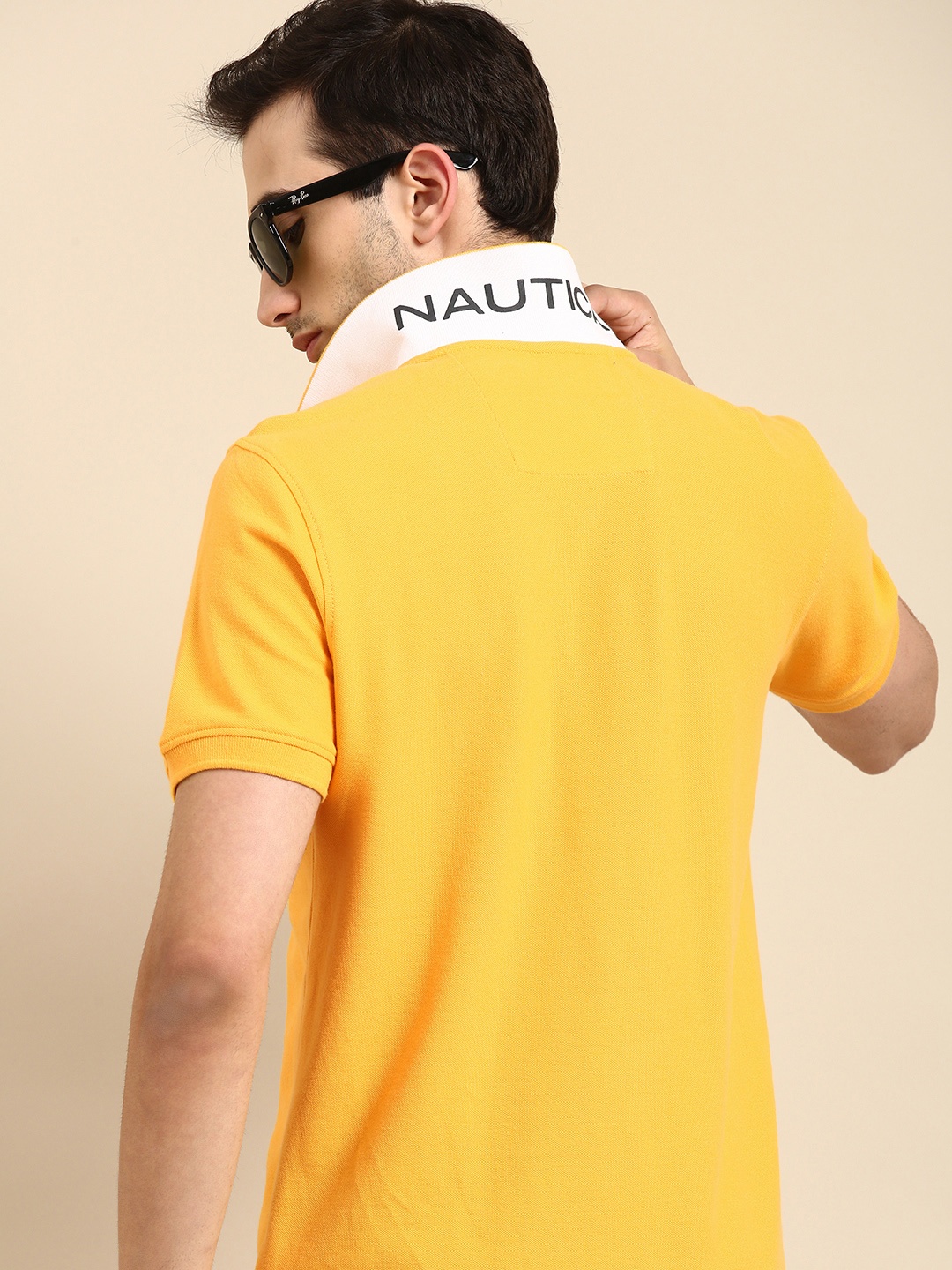 

Nautica Men Yellow Solid Slim Fit Pure Cotton Polo Collar Pure Cotton T-shirt
