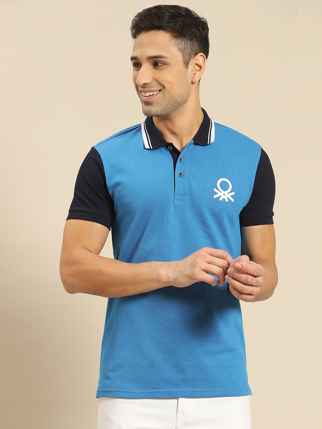 

United Colors of Benetton Men Blue Brand Logo Pure Cotton Polo Collar Pure Cotton T-shirt
