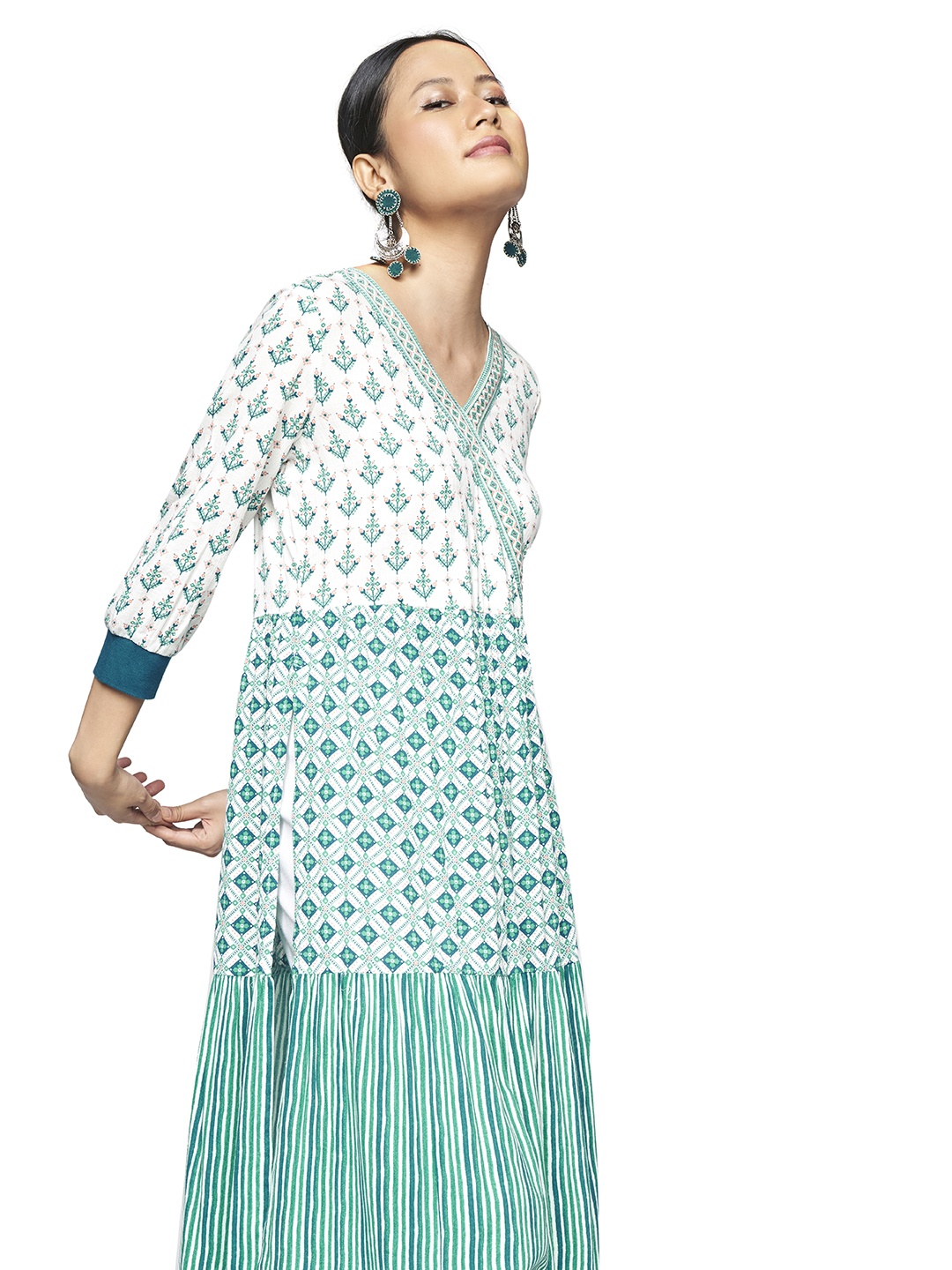 

Global Desi Women White & Green Floral V- Neck High Slit Printed Kurta