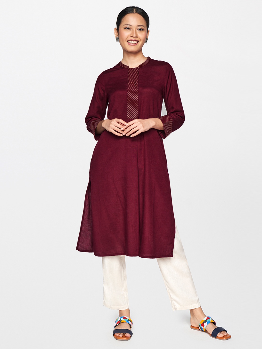 

Global Desi Women Maroon Yoke Design Flared Sleeves Kurta