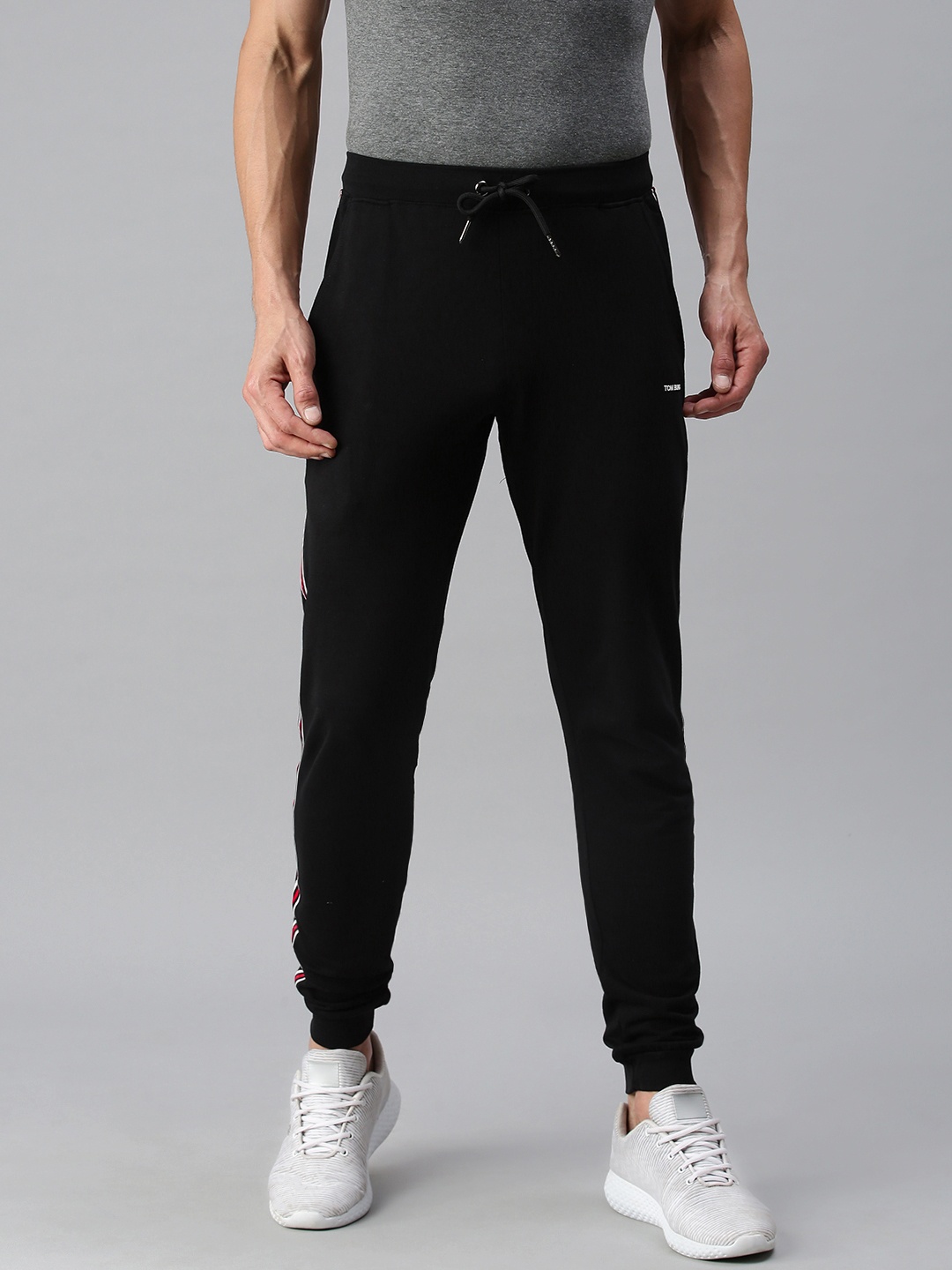 TOM BURG Men Black Solid Trackpant - buy at the price of $11.88 in ...