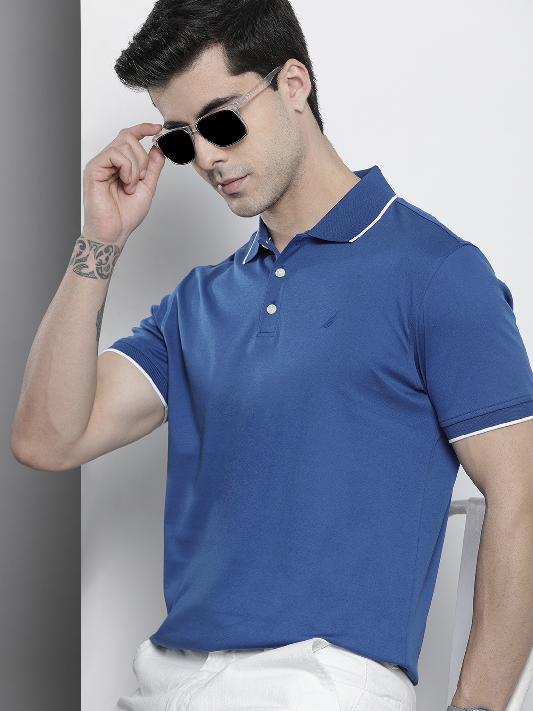 

Nautica Men Blue Solid Polo Collar Pure Cotton T-shirt