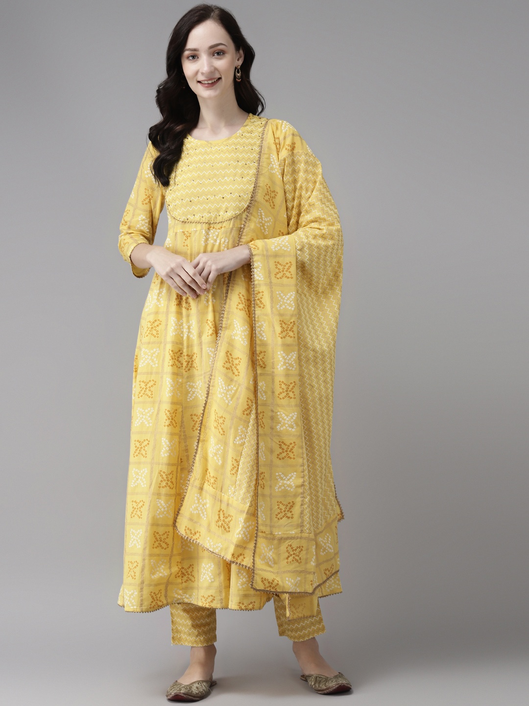 

Indo Era Women Yellow Floral Embroidered Regular Kurta with Trousers & Dupatta