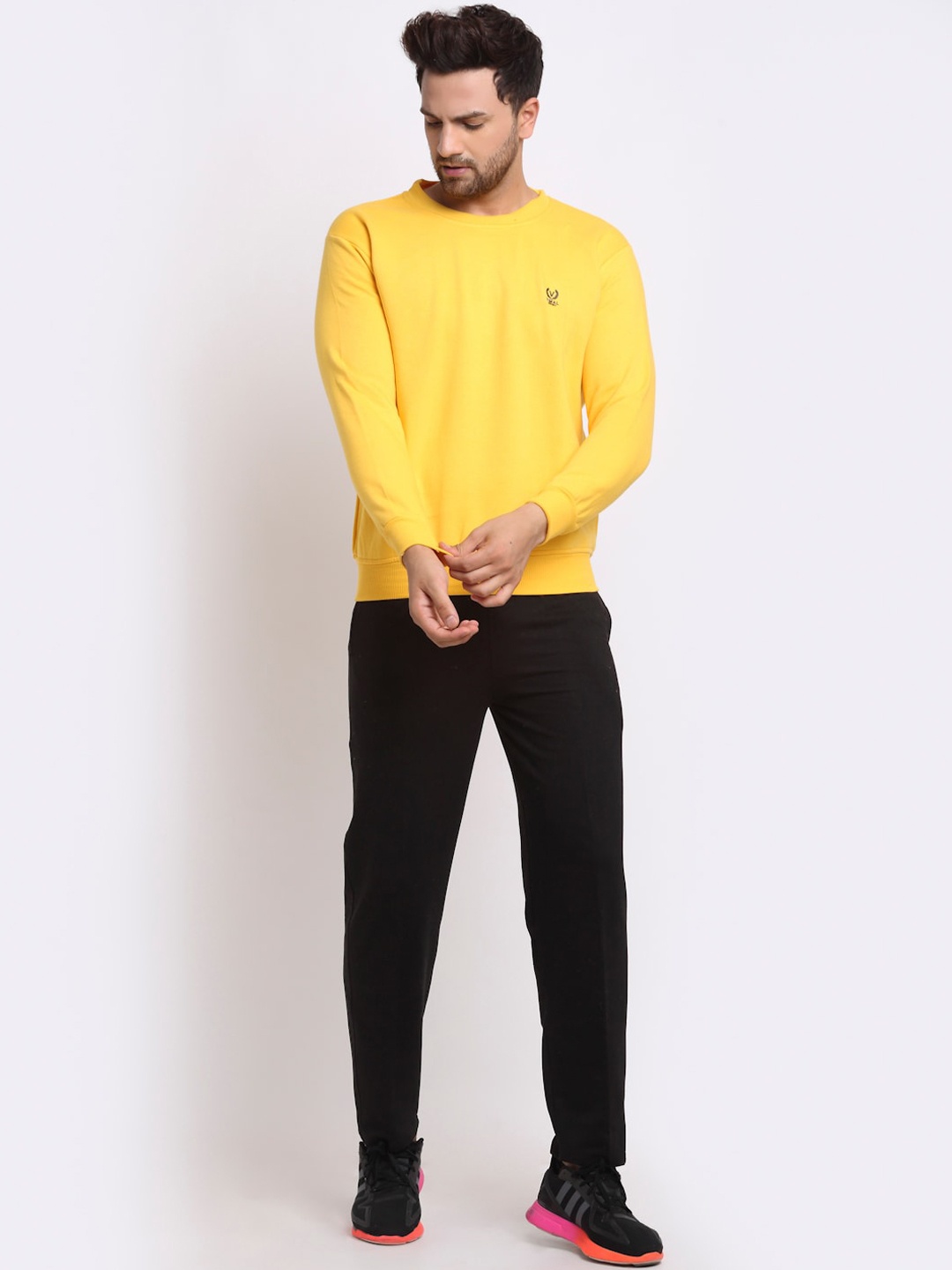 

VIMAL JONNEY Men Black & Yellow Solid Tracksuits