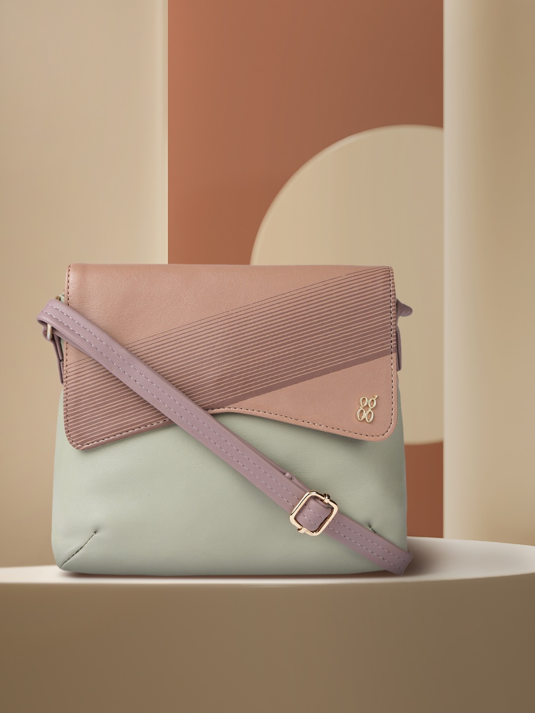 

Baggit Women Green & Beige Colourblocked Printed Structured Sling Bag