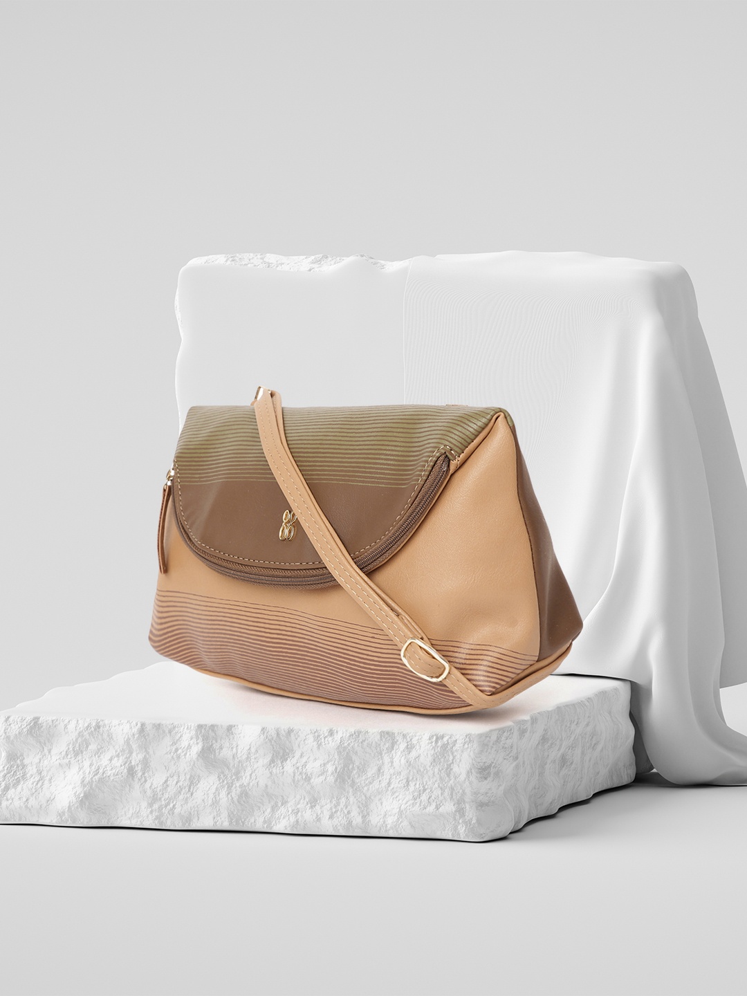 

Baggit Beige Striped Sling Bag
