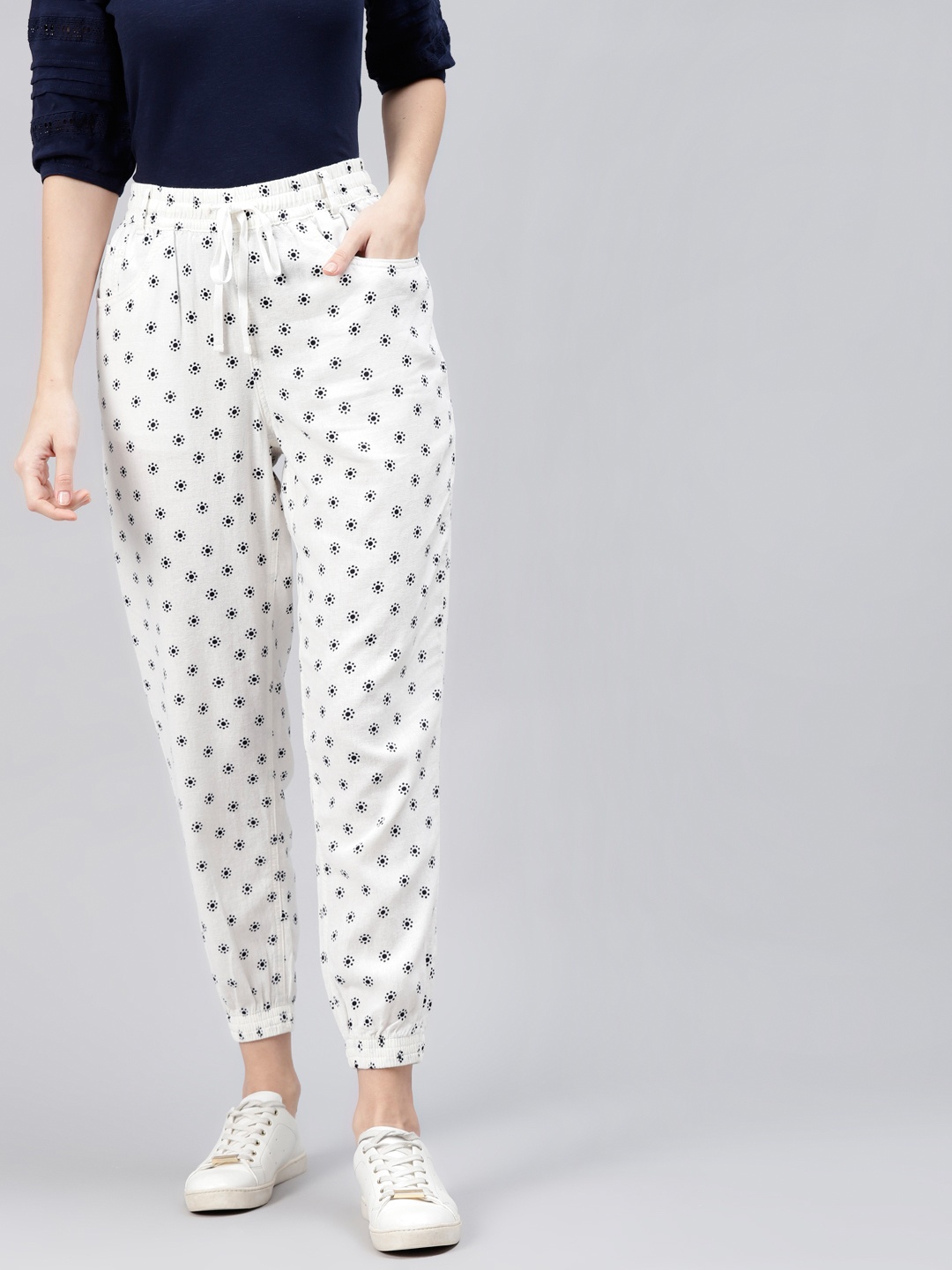 

Marks & Spencer Women White Floral Printed Slim Fit Linen Joggers Trousers