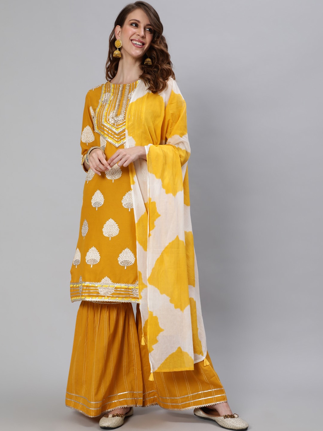 

Ishin Mustard Yellow Printed Gotta Patti Pure Cotton Kurta with Sharara & With Dupatta