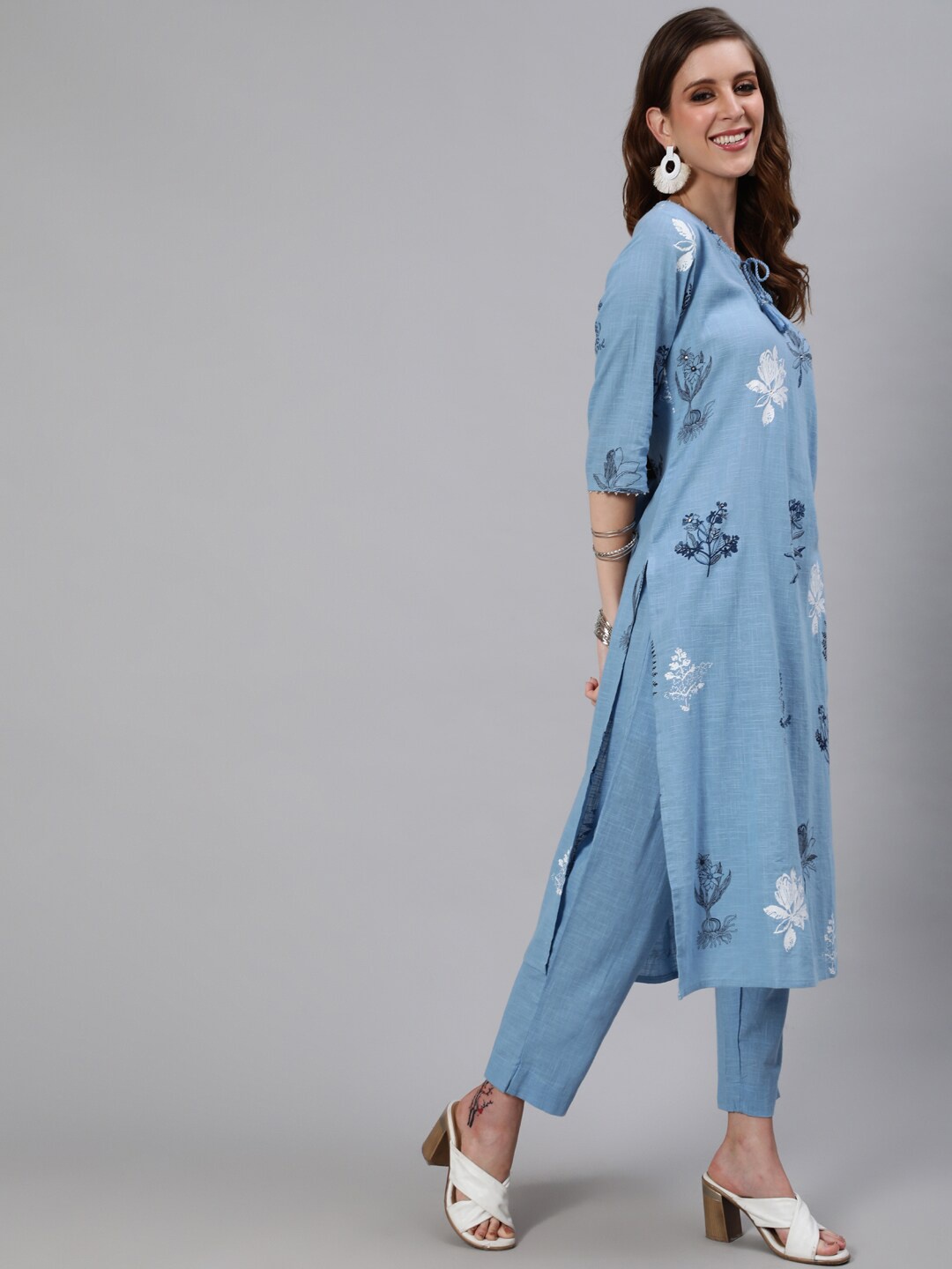 

Ishin Women Blue Printed Regular Pure Cotton Kurta with Trousers