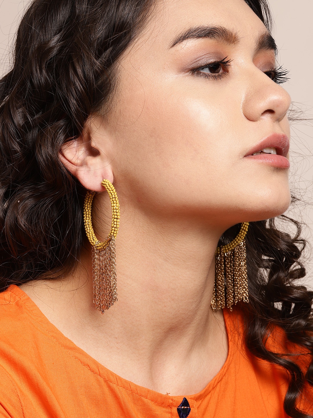 

Sangria Mustard Yellow & Gold-Toned Beaded Tasseled Circular Hoop Earrings