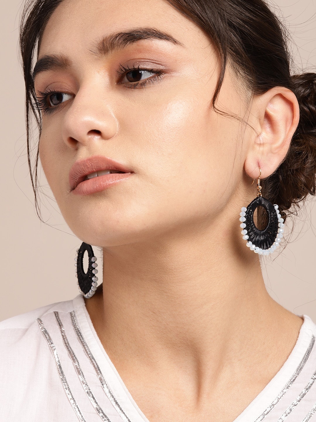 

Sangria Black & Off-White Beaded Threadwork Circular Drop Earrings