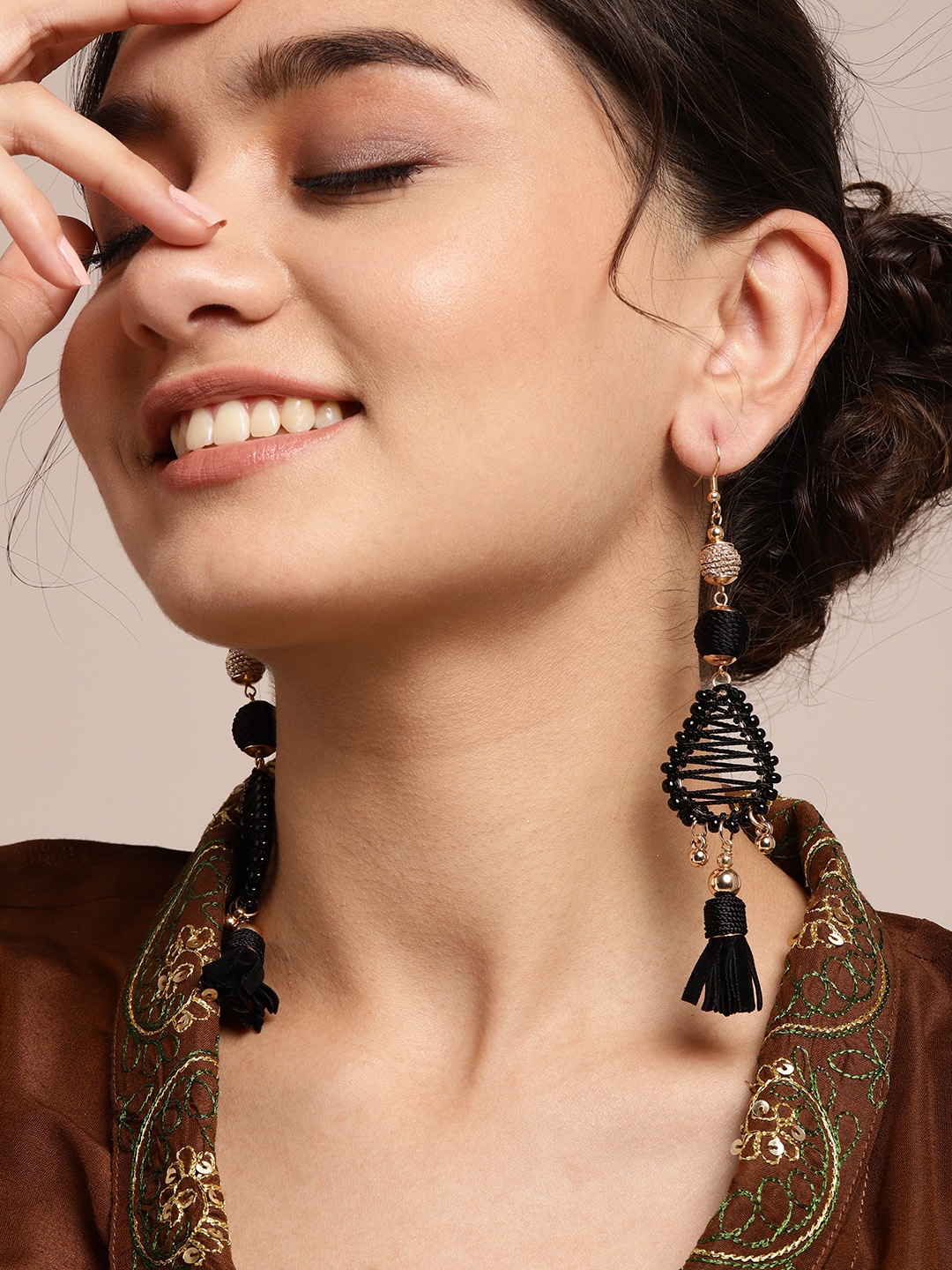 

Sangria Black & Gold-Toned Handcrafted Beaded Tasselled Contemporary Drop Earrings