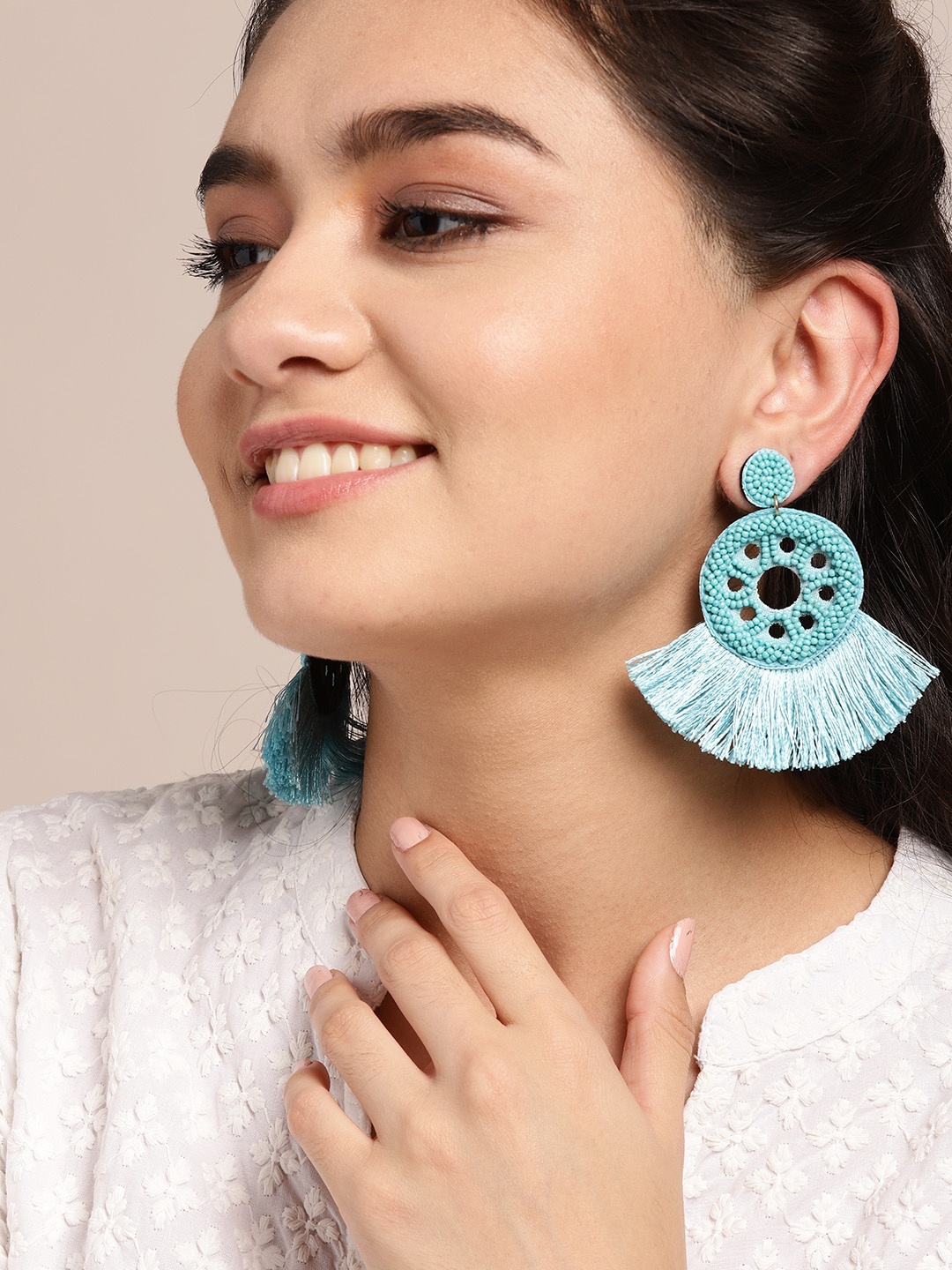 

Sangria Blue Beaded Circular Tasselled Drop Earrings