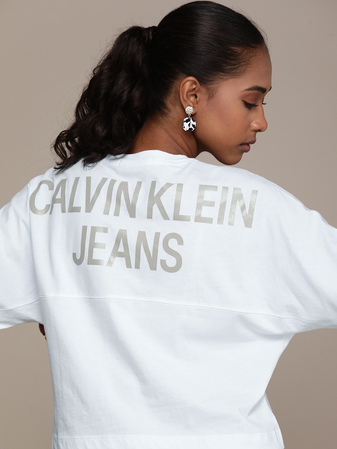

Calvin Klein Jeans Women White Brand Logo Printed Drop-Shoulder Sleeves T-shirt