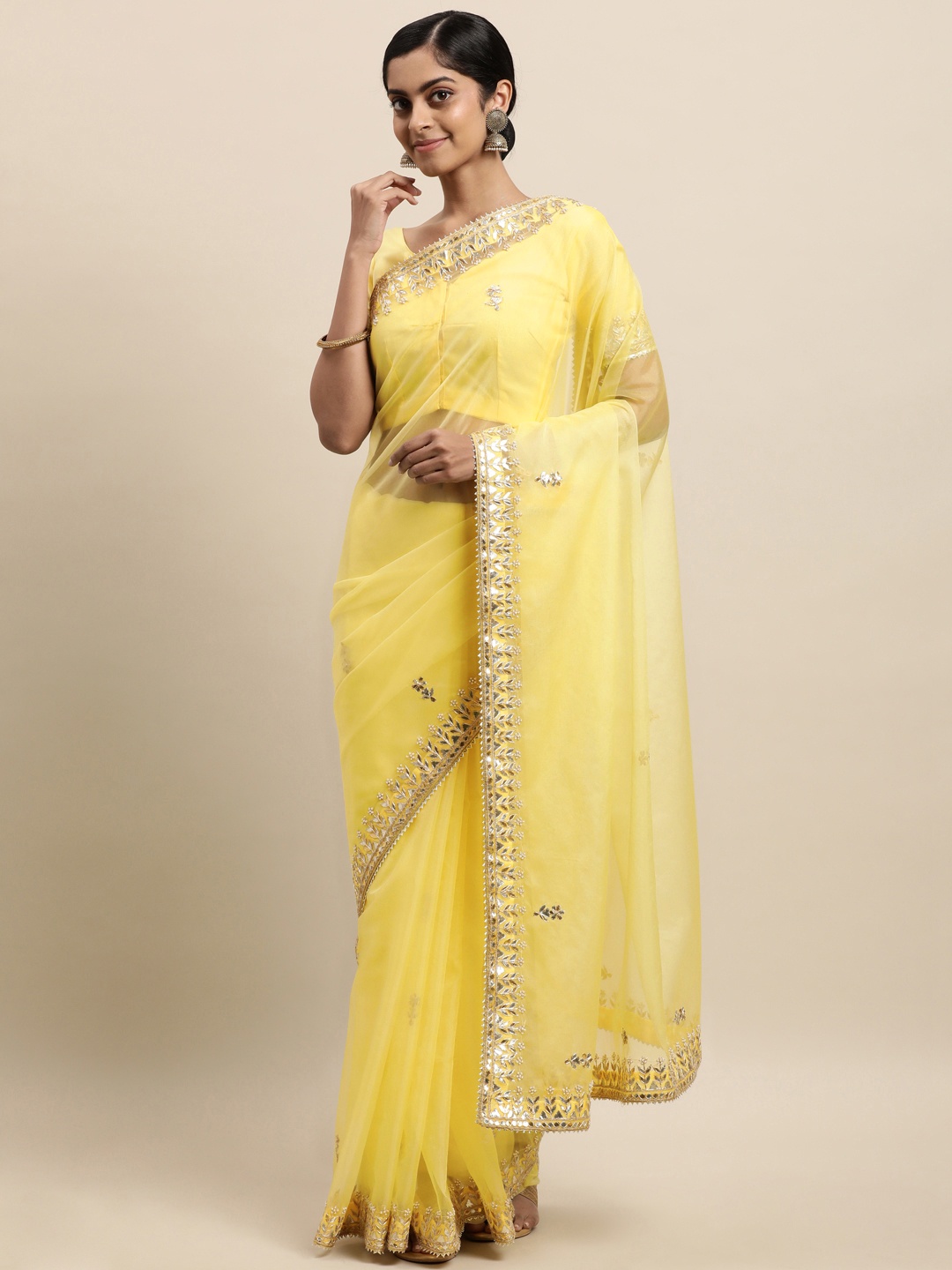 

Geroo Jaipur Yellow Embellished Gotta Patti Organza Saree