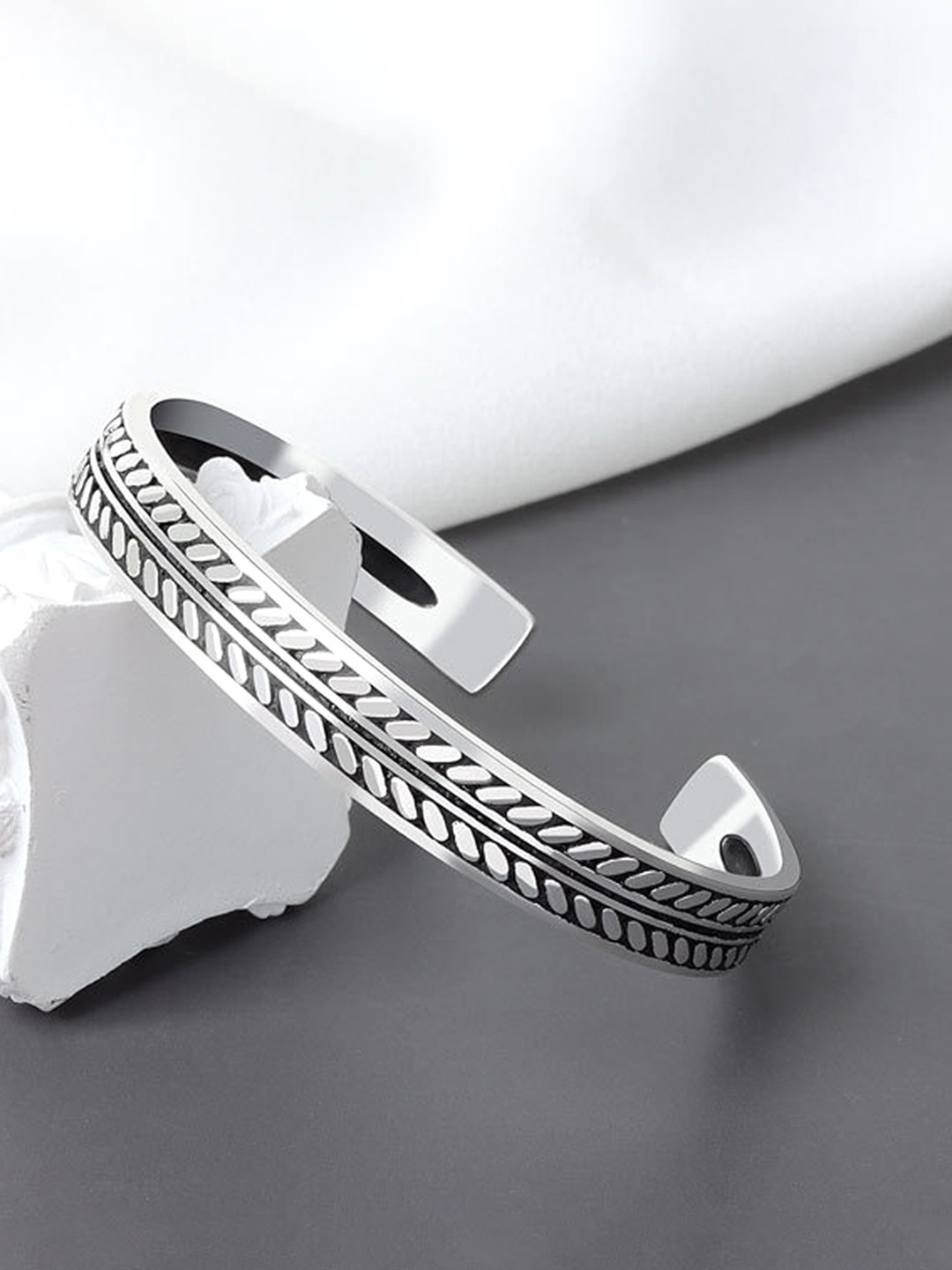 

Yellow Chimes Women Silver-Toned Oxidised Kada Cuff Bracelet