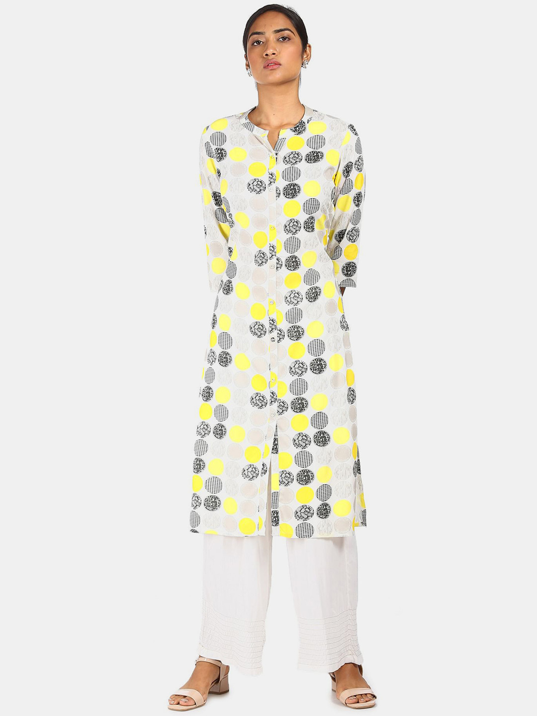 

Karigari Women Off-White & Yellow Geometric Printed Regular Kurta