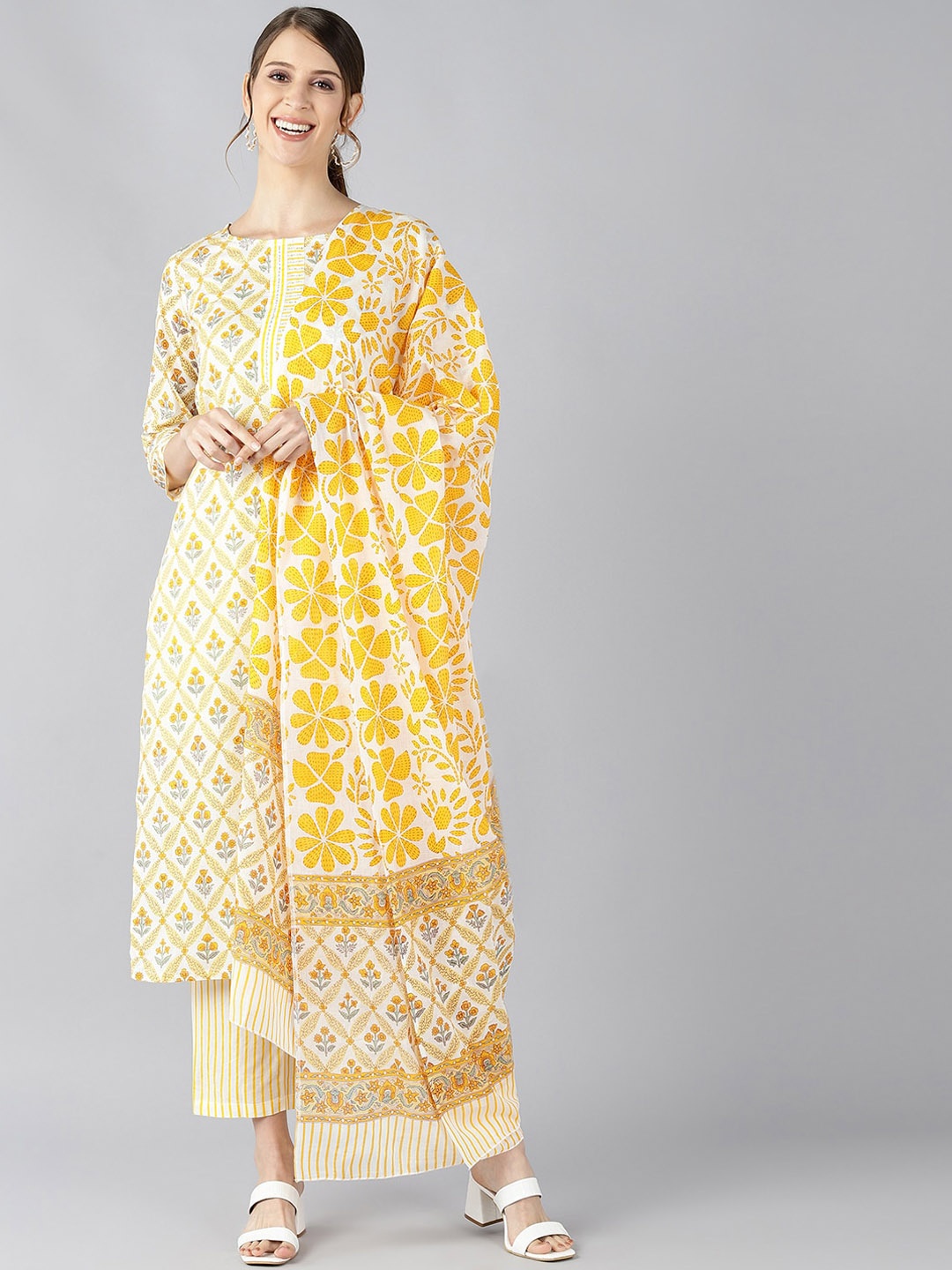 

AHIKA Women Yellow Printed Regular Pure Cotton Kurta with Trousers & With Dupatta