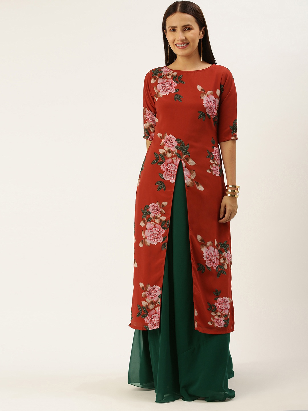 

Ethnovog Women Orange Floral Printed Regular Kurta with Skirt