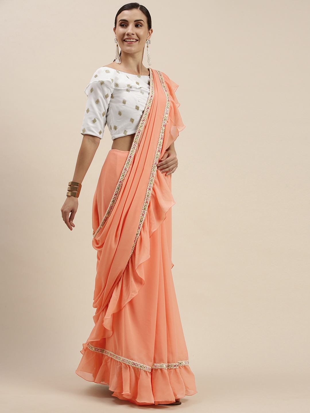 

Ethnovog Peach-Coloured White Ruffle Saree With Stitched Blouse