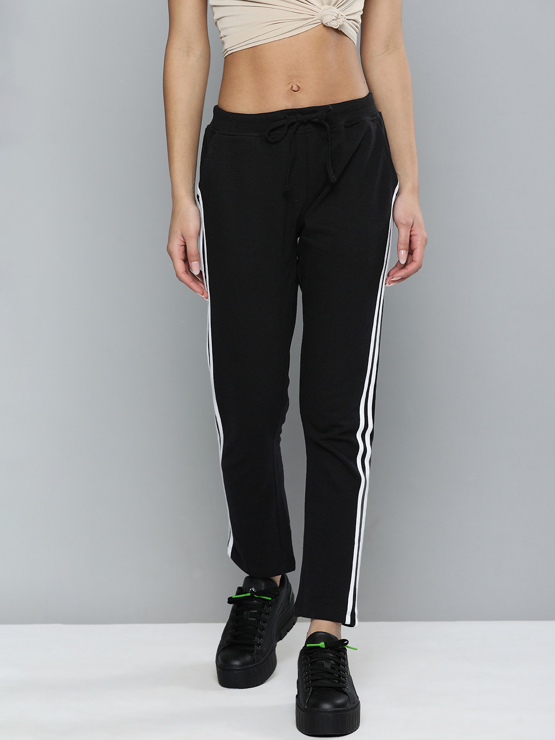 

Harvard Women Black Solid Regular Fit Mid Rise Track Pants With Side Stripes