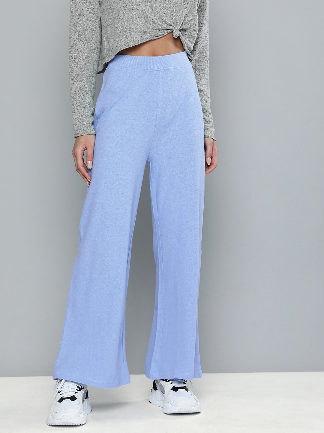 

Harvard Women Blue Solid Regular Fit Mid Rise Flared Track Pants