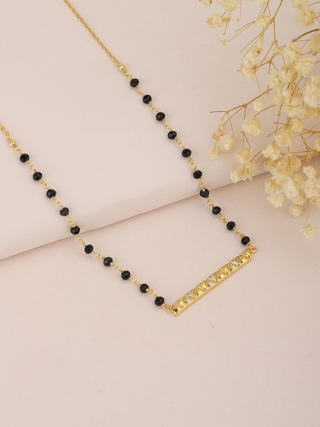 

Carlton London Women Black & Gold-Toned Artificial Stone Studded Mangalsutra