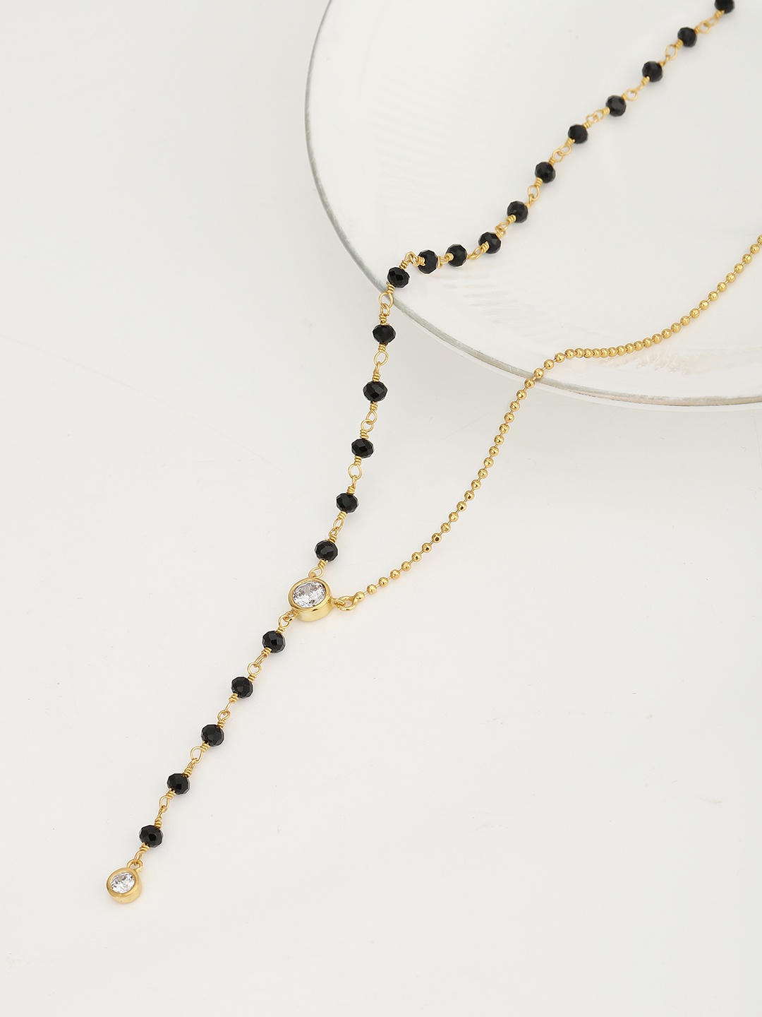 

Carlton London Women Black & Gold-Toned Artificial Stone Studded Mangalsutra