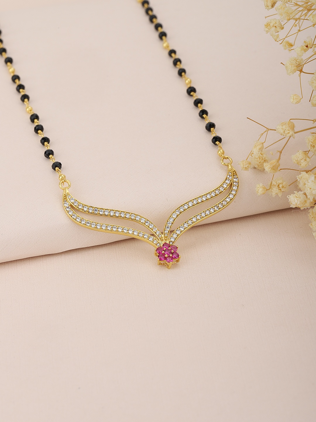 

Carlton London Women Black & Gold-Toned Artificial Stone Studded Mangalsutra