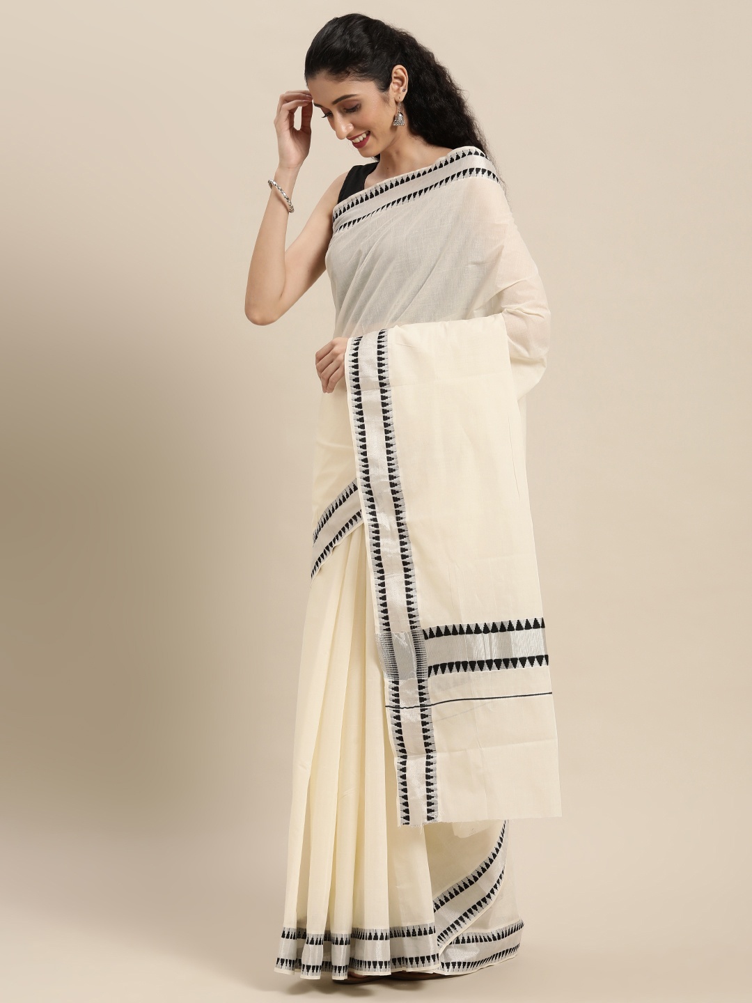 

Thara Sarees Off White & Black Zari Pure Cotton Kasavu Saree