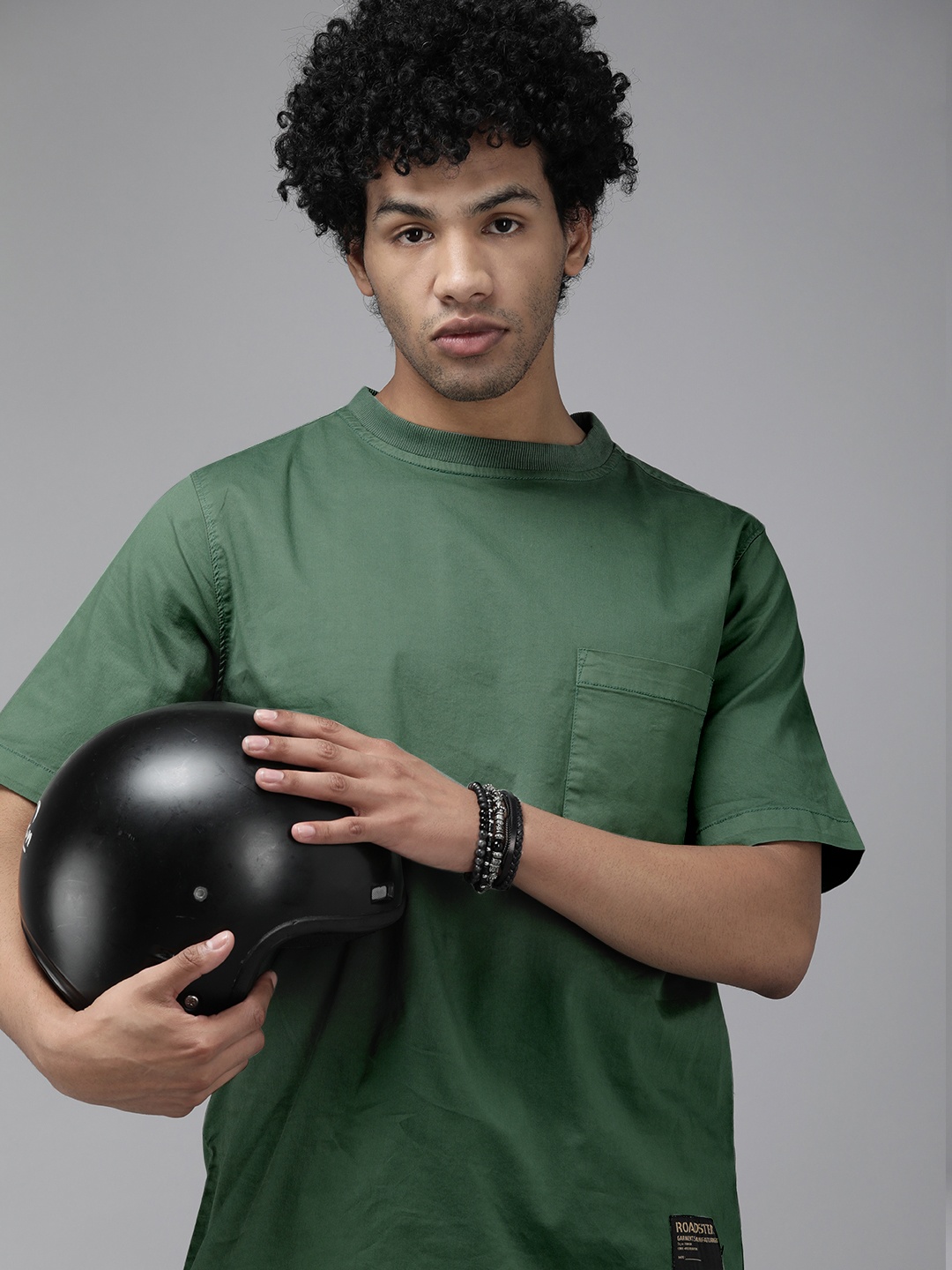 

Roadster Men Green Solid T-shirt