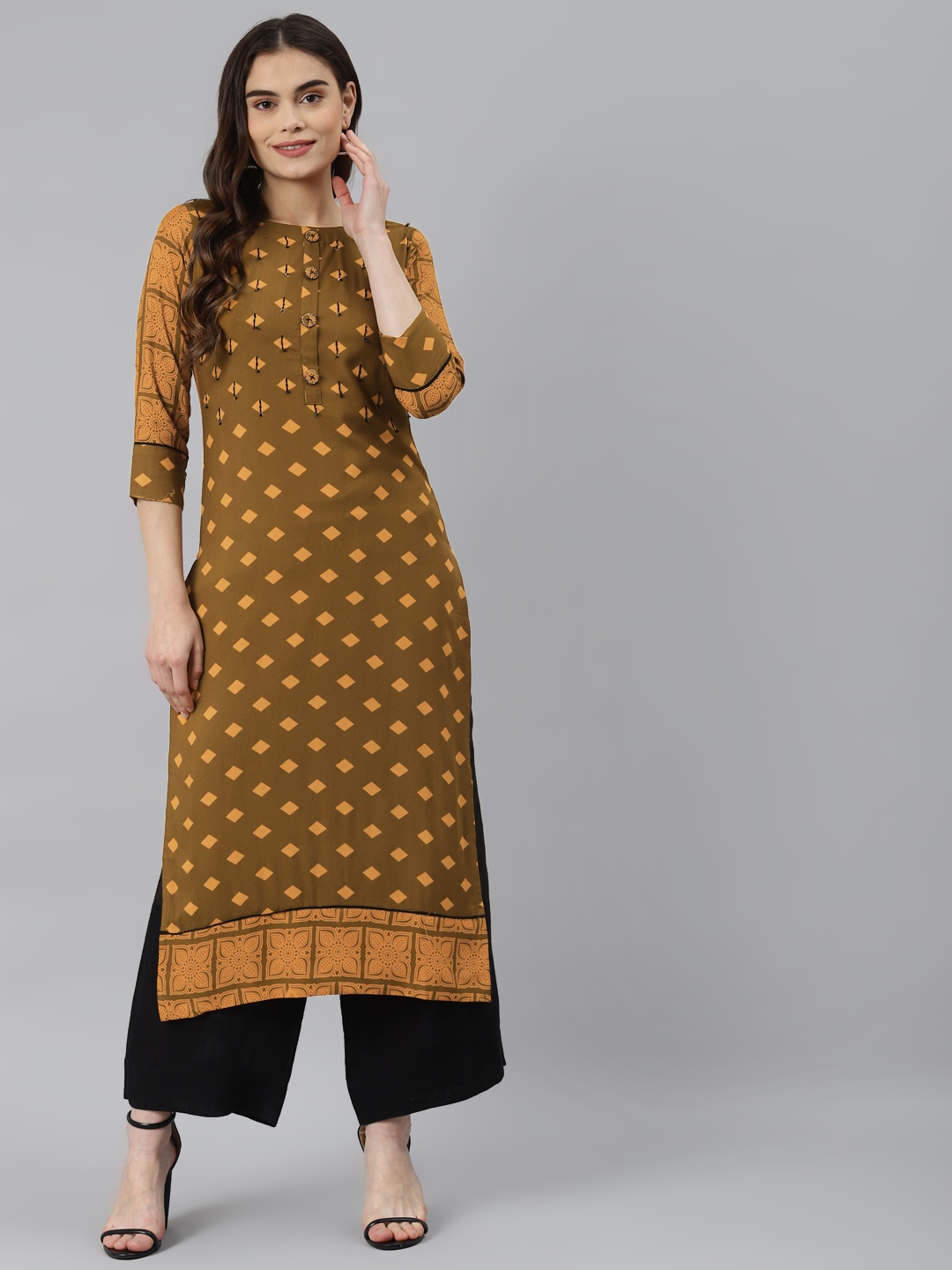 

Nehamta Women Brown & Mustard Yellow Ethnic Motifs Printed Kurta