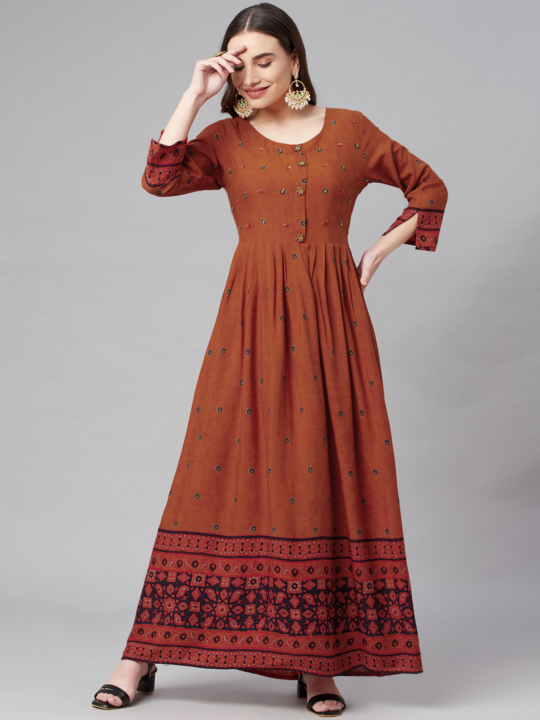 

Nehamta Rust Orange Ethnic Motifs Printed Maxi Dress