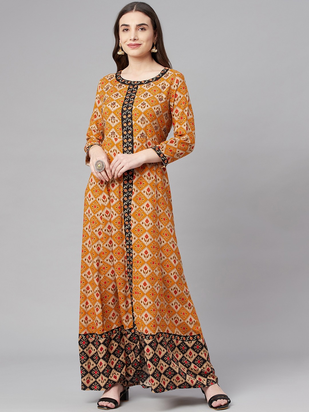 

Nehamta Mustard Yellow & Black Ethnic Motifs Printed Maxi Dress