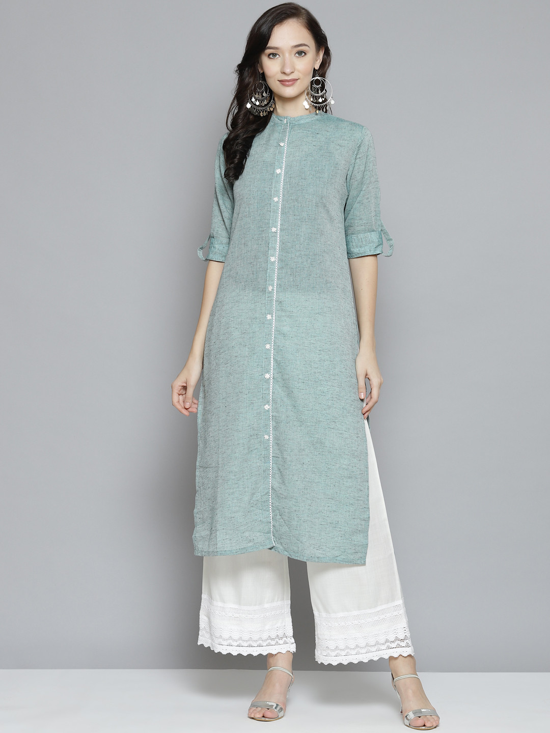 

Bhama Couture Women Green Striped Regular Kurta with Palazzos