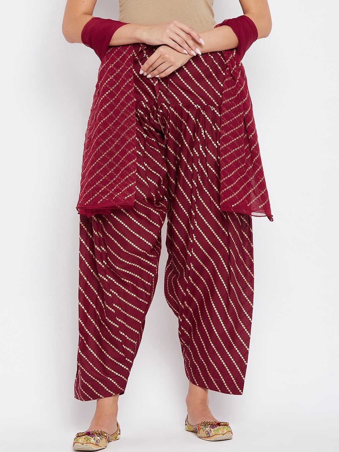 

Clora Creation Women Maroon & Gold-Coloured Leheriya Printed Cotton Loose-Fit Salwar With Dupatta