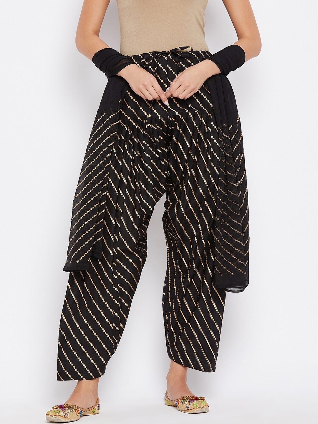 

Clora Creation Women Black & Gold-Coloured Leheriya Printed Cotton Loose-Fit Salwar With Dupatta