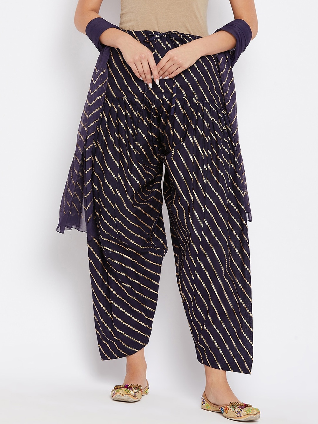 

Clora Creation Women Navy Blue & Gold-Coloured Leheriya Printed Cotton Loose-Fit Salwar With Dupatta