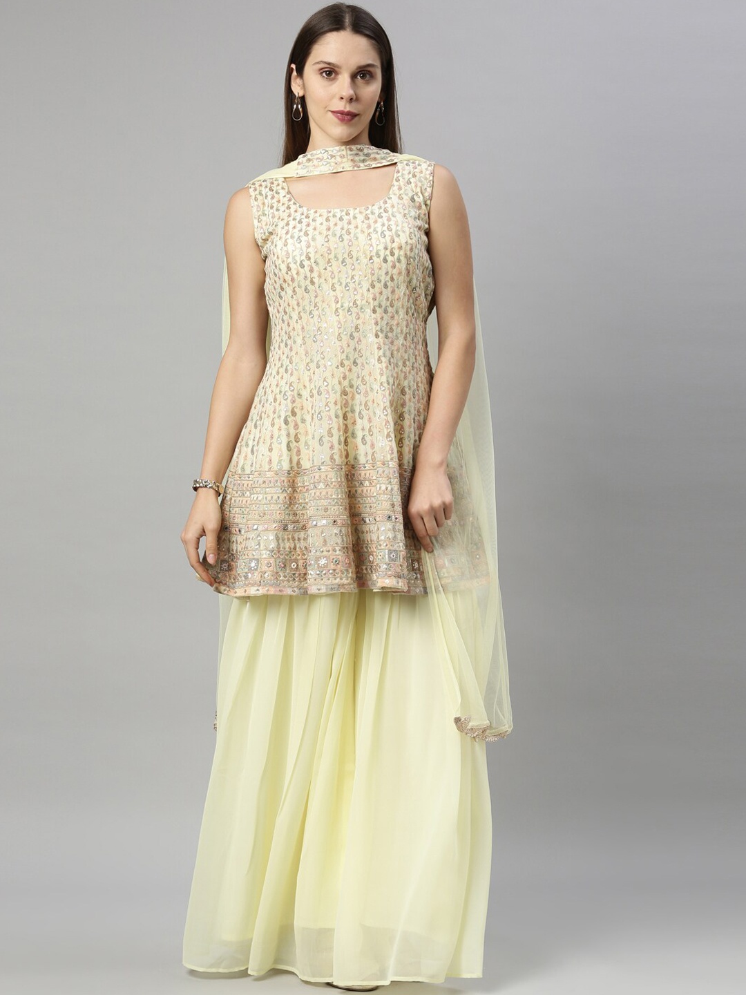 

Neerus Women Yellow Ethnic Motifs Embroidered Regular Sequinned Silk Georgette Kurta with Sharara & With