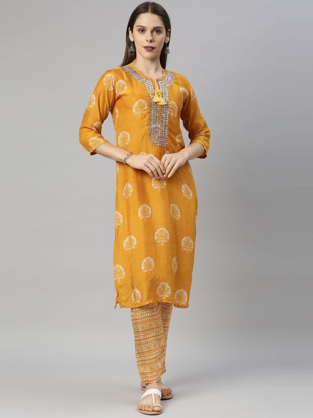 

Neerus Women Mustard Yellow Ethnic Motifs Printed Regular Mirror Work Kurta with Trousers & With Dupatta
