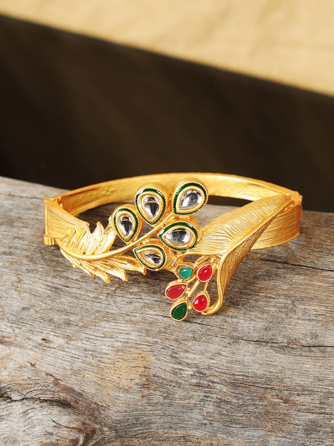 

ANIKAS CREATION Women Gold-Plated & Red Cubic Zirconia Bangle-Style Bracelet